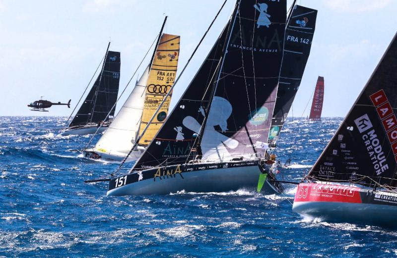 The ten-strong Class40 fleet with the media helicopter capturing their start - RORC Caribbean 600 photo copyright RORC / Arthur Daniel taken at Royal Ocean Racing Club and featuring the Class 40 class