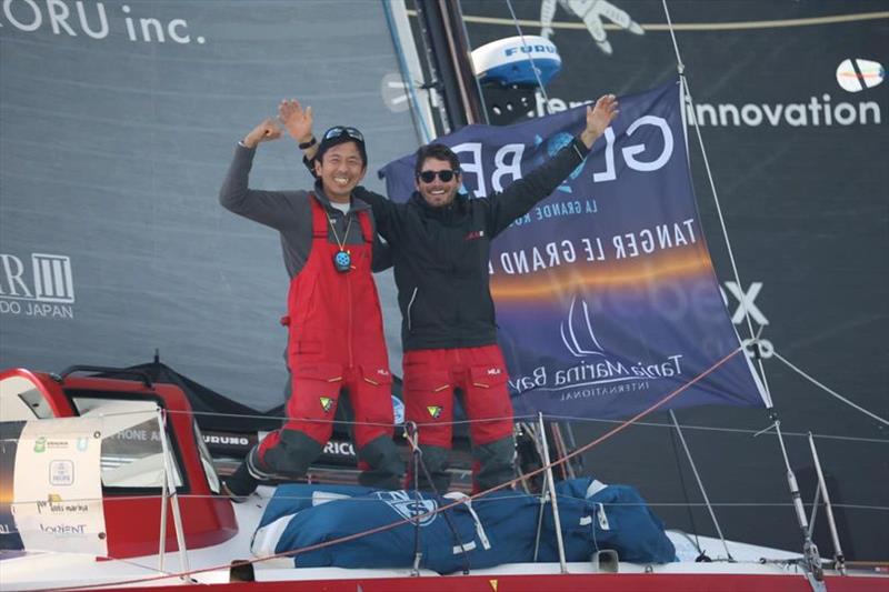 Masa Suzuki (JPN) and Luca Rossetti (ITA) celebrate finishing second on Leg 3 of the Globe40 mid-morning October 16, 2022 photo copyright Globe40 taken at Royal New Zealand Yacht Squadron and featuring the Class 40 class