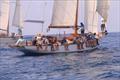 125-year-old Galatea's crew exchanging stories on the rail - 2024 Antigua Classic Yacht Regatta