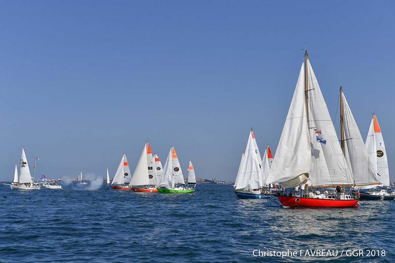 Sir Robin fires the race start cannon in Les Sables - photo © Christophe Favreau / GGR2018