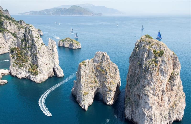 The three towering rocks that form the Faraglioni are one of the Capri's main landmarks the schooner crews will get to sail by photo copyright ROLEX / Studio Borlenghi taken at Yacht Club Capri and featuring the Classic Yachts class