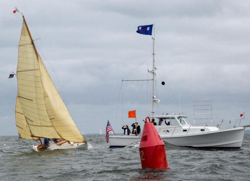 Commodore Fogarty and Cadenza receive a salute as they cross the finish line - Classic Yacht Regatta 2019 photo copyright Mary Alice Carmichael taken at Indian Harbor Yacht Club and featuring the Classic Yachts class