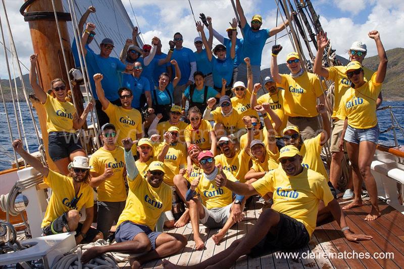 Columbia's crew celebrating the end of the 3-day racing series - Antigua Classic Yacht Regatta photo copyright Claire Matches / www.clairematches.com taken at Antigua Yacht Club and featuring the Classic Yachts class