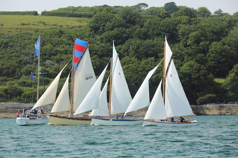Crossing the finishing line in the idyllic conditions experienced on the Friday of Falmouth Classics 2022 photo copyright Nigel Sharp taken at Port of Falmouth Sailing Association and featuring the Classic Yachts class