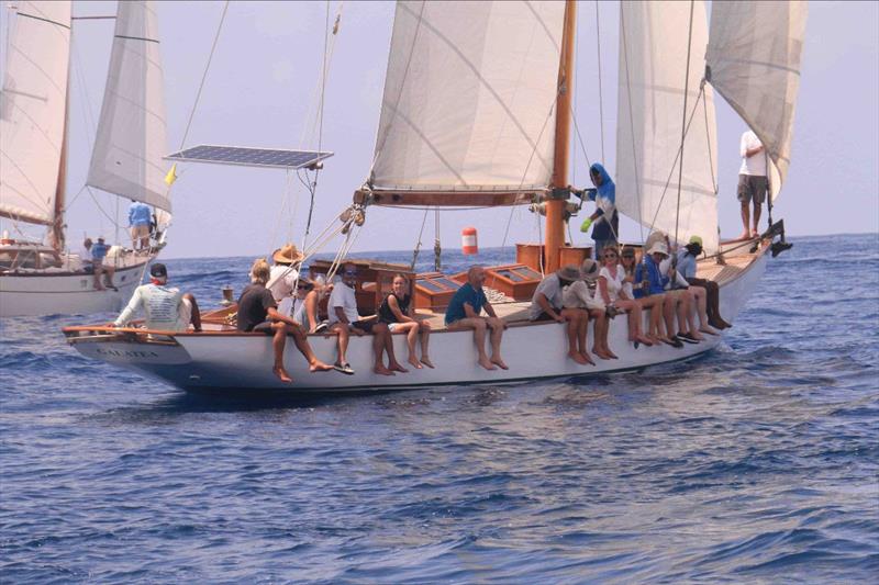 125-year-old Galatea's crew exchanging stories on the rail - 2024 Antigua Classic Yacht Regatta photo copyright David Lyman taken at Antigua Yacht Club and featuring the Classic Yachts class