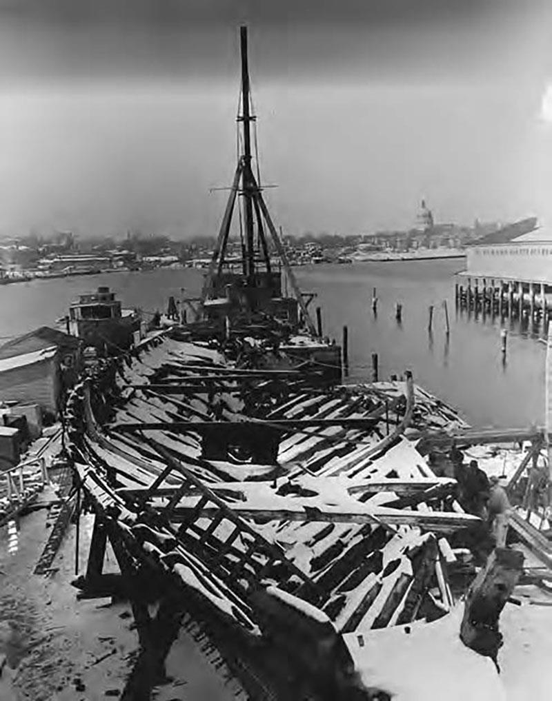 Remains of America at the Annapolis Yacht Yard following the March 1942 shed collapse - photo © NATIONAL ARCHIVES AT COLLEGE PARK, MARYLAND, RG 19-LCM.