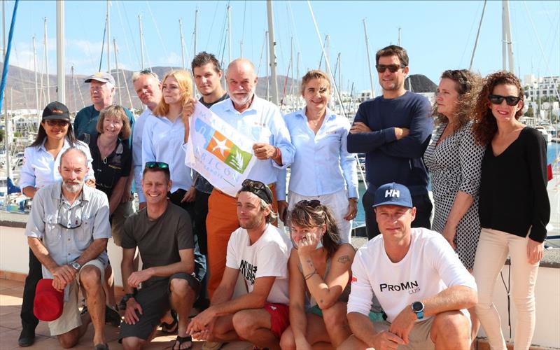 Entrants and the organising team in Lanzarote - McIntyre Adventure's Globe 5.80 Transat leg 2 photo copyright Don McIntyre taken at  and featuring the Class Mini 5.80 class