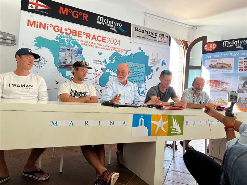 Departure Press Conference in Lanzarote with all entrants (L-R: Michal, Etienne, Don, Peter and Jim) - McIntyre Adventure's Globe 5.80 Transat leg 2 photo copyright Don McIntyre taken at  and featuring the Class Mini 5.80 class