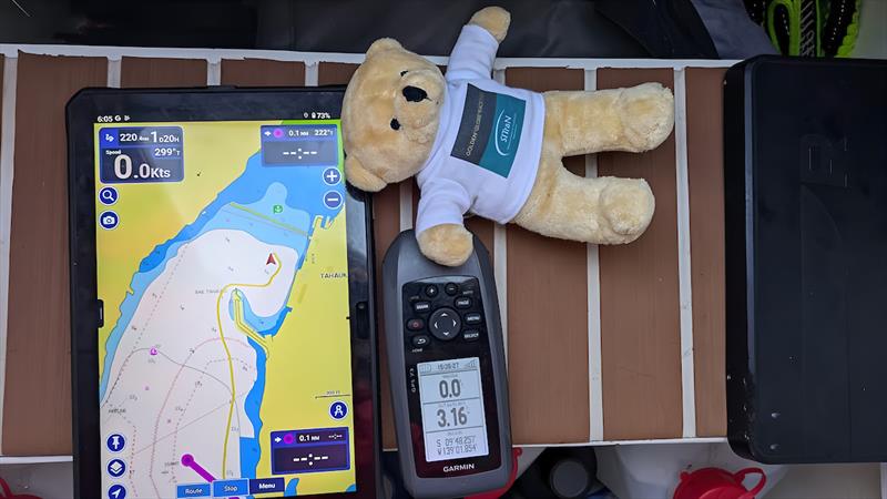 Pilar Pasanau (#98 Peter Punk / ESP) arrival photo: all entrants must take a photo of their chartplotter/GPS ( with SITraN teddy!) once they drop anchor to start the clock for their 8 day pit-stop - photo © Pilar Pasanau / MGR