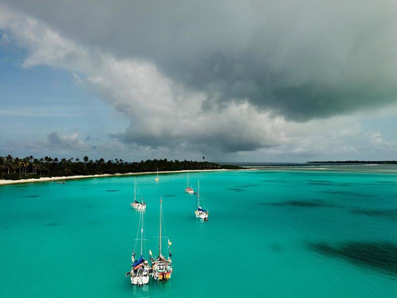 The entire fleet of eleven ALMA Globe 580s eventually congregated in the stunning, if blustery, lagoon of Cocos (Keeling) Atoll. Each arrival was a drama in itself - photo © SV Sipi