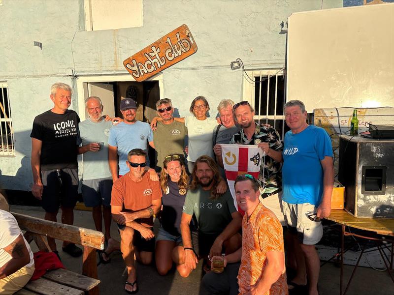 A special moment in St Helena — 11 #MGR2025 skippers present the race pennant to the Saint Helena Yacht Club - photo © Adam Waugh / MGR2025