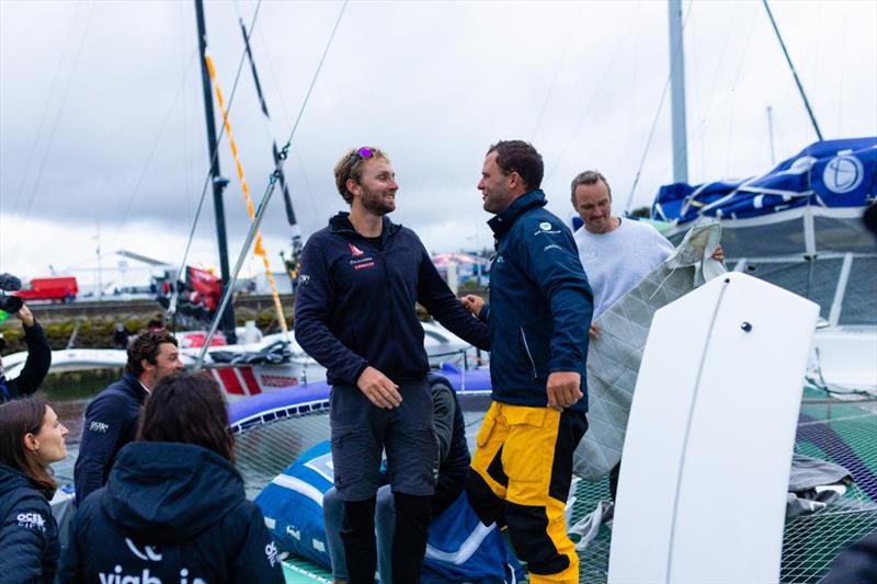 After an intense two-day match race at sea, Luke Berry and Pierre Quiroga congratulate each other on the race - 50th Rolex Fastnet Race 2023 photo copyright Arthur Daniel / RORC taken at Royal Ocean Racing Club and featuring the OCEAN50 class