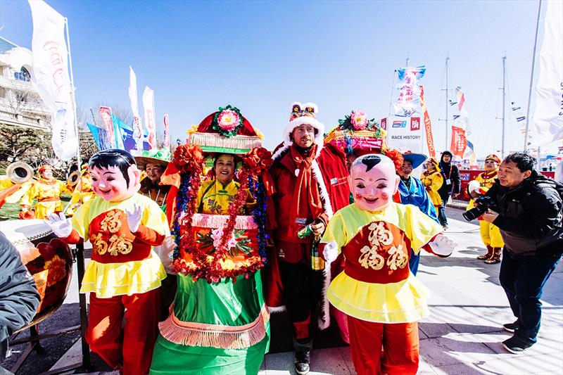 asdaq skipper Rob Graham in traditional Chinese Brocade hat and cape - Clipper 2017-18 Round the World Yacht Race photo copyright Clipper Race taken at  and featuring the Clipper 70 class