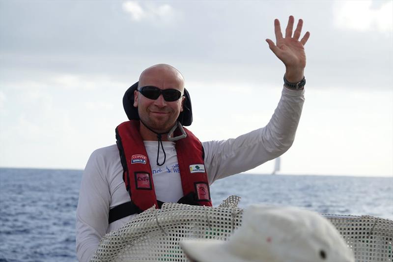 Dmitry on the helm near the equator, taken by Ming on board team yacht Sanya Serenity Coast photo copyright Ming taken at  and featuring the Clipper 70 class