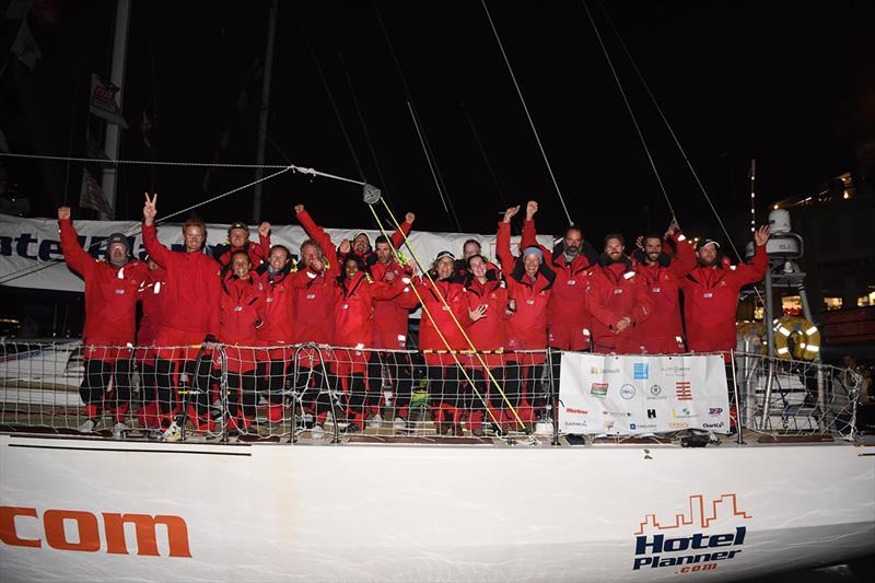 The HotelPlanner.com team celebrates finishing Race 11 to New York photo copyright Mike Lawrence taken at  and featuring the Clipper 70 class
