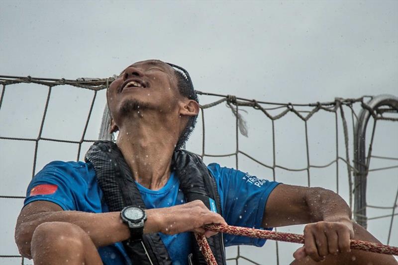 Yang smiling in the rain, on board Visit Sanya, China - The Clipper Race Leg 5 - Race 6, Day 17 photo copyright Clipper Race taken at  and featuring the Clipper 70 class