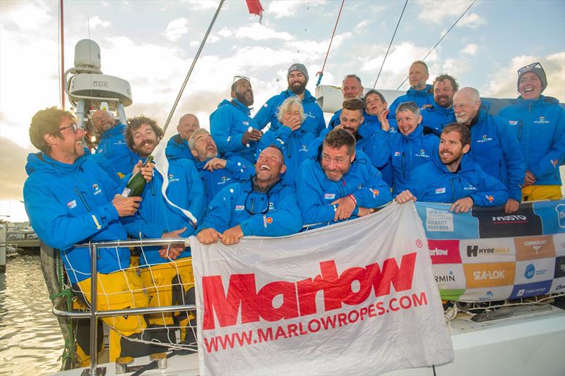 Terri and the Ha Long Bay, Viet Nam team celebrate their podium position (Terri centre row, third from right) photo copyright Clipper Race taken at  and featuring the Clipper 70 class
