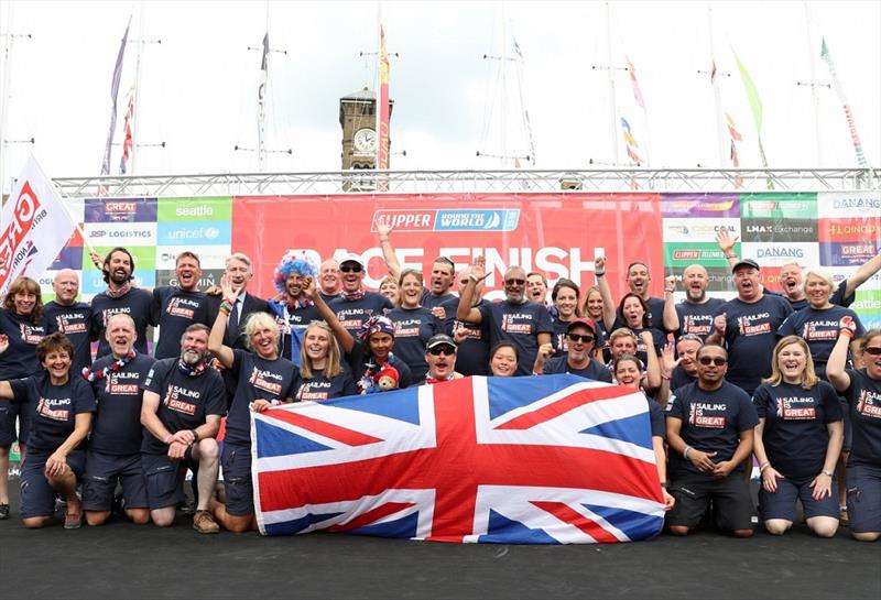 Simon (bottom row, centre) celebrates with his team mates at the Clipper 2015-16 Race Finish in London photo copyright Clipper Race taken at  and featuring the Clipper 70 class