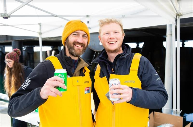 Steve Smith and Charles Freeman enjoy a cold beer on arrival - Clipper Race photo copyright Clipper Race taken at  and featuring the Clipper 70 class