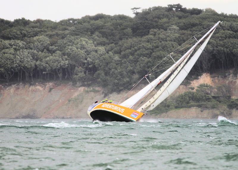 The 2023 Round the Island Race fleet pass through the Hurst narrows photo copyright Sam Jardine taken at Island Sailing Club, Cowes and featuring the Clipper 70 class