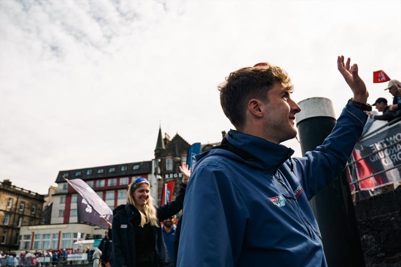 Circumnavigator Thomas Roy on Team Tongyeong waves to the crowds as the Clipper Race fleet departs from Oban, Scotland - photo © Clipper Ventures