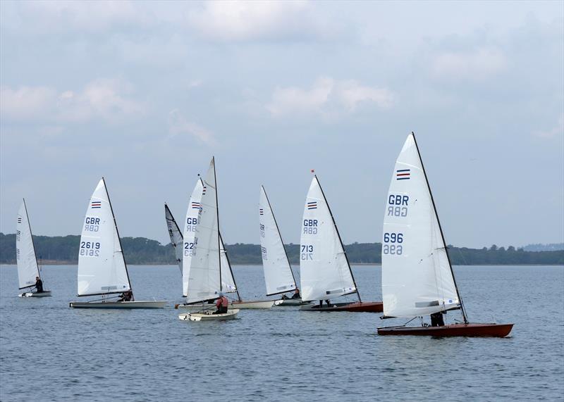 Contender fleet blessed/tormented with light winds at Poole photo copyright Mike Millard / www.mikemillard.com taken at Poole Yacht Club and featuring the Contender class