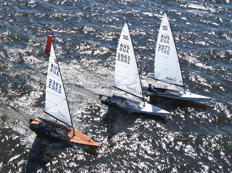 Three wide at the mark - James Ellis (2323), Paul Wilson (2665), and Lachlan Imeneo (2571) photo copyright Ron Parker taken at Gippsland Lakes Yacht Club and featuring the Contender class