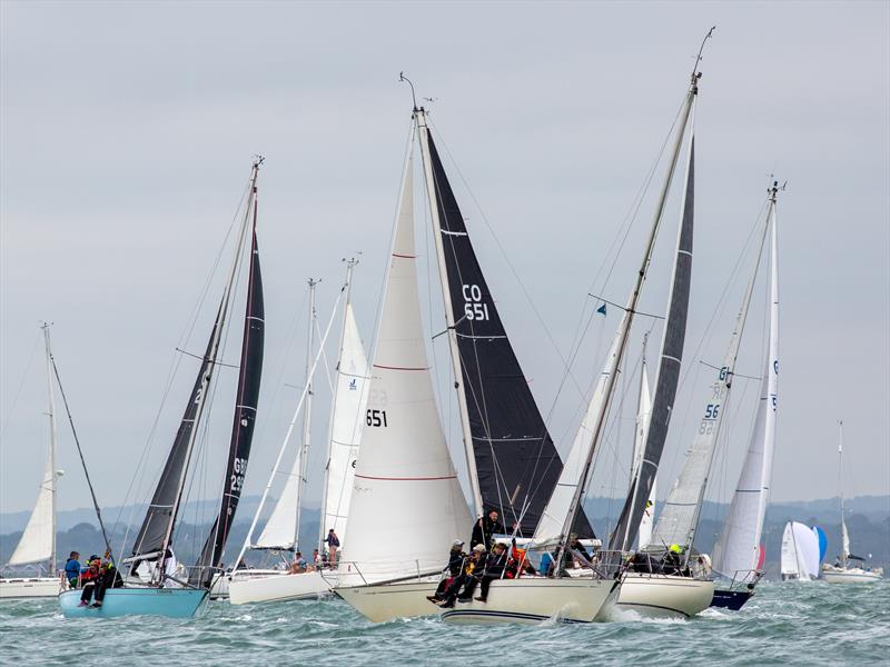 Contessa 32 fleet on Day 2 of Cowes Week 2025 photo copyright Martin Augustus / www.sailingimages.co.uk taken at Cowes Combined Clubs and featuring the Contessa 32 class