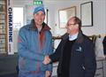Sean Craig receiving a prize from Craftinsure's Rod Daniel during the Laser Munster Championships © BSC