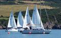 Larger cruiser yacht race getting underway with the Race Committee on “Alicat” the Committee boat at anchor, one end of the start line at Kippford Week 2022 © Becky Davison