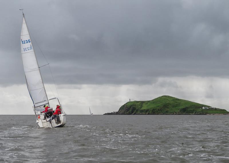 Heading for Hestan; 'Osprey II' helmed by Paul Gray with crew Gavin Phillips, 'Kintra' already along way ahead during the Catherinefield Windows RNLI Regatta in Kippford - photo © John Sproat