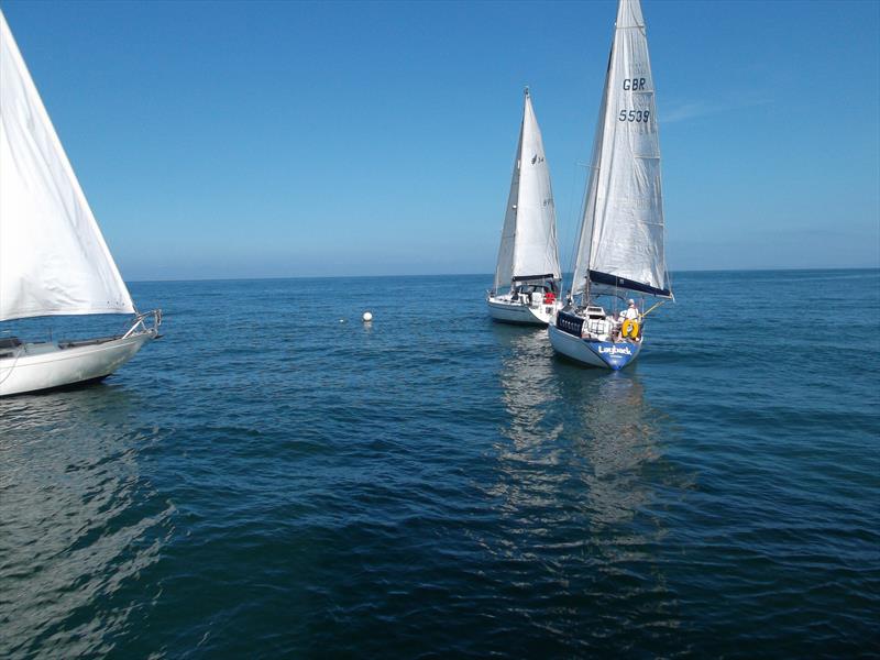 Alan Walker's Regina 35 leads David fletcher's Nicholson 30 Half ton in the Friendship Race photo copyright Ian Banton / Ray Ker taken at Whitehaven Sailing & Boating Association and featuring the Cruising Yacht class