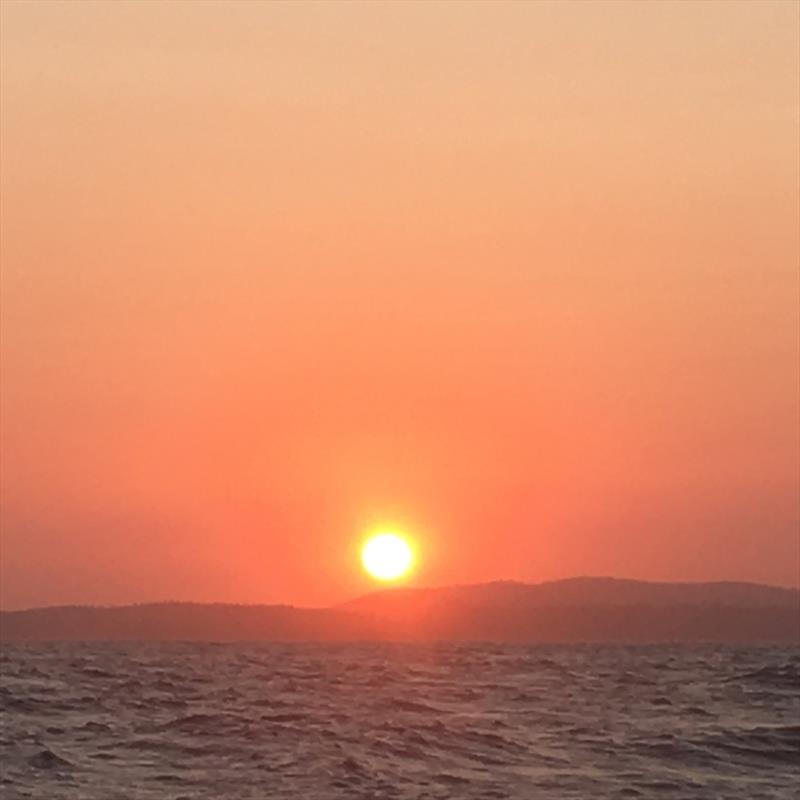 Who could ever tire of these sunsets at sea? Enjoying a stunning evening before our first pitch black bar crossing photo copyright Kristen Anderson taken at  and featuring the Cruising Yacht class