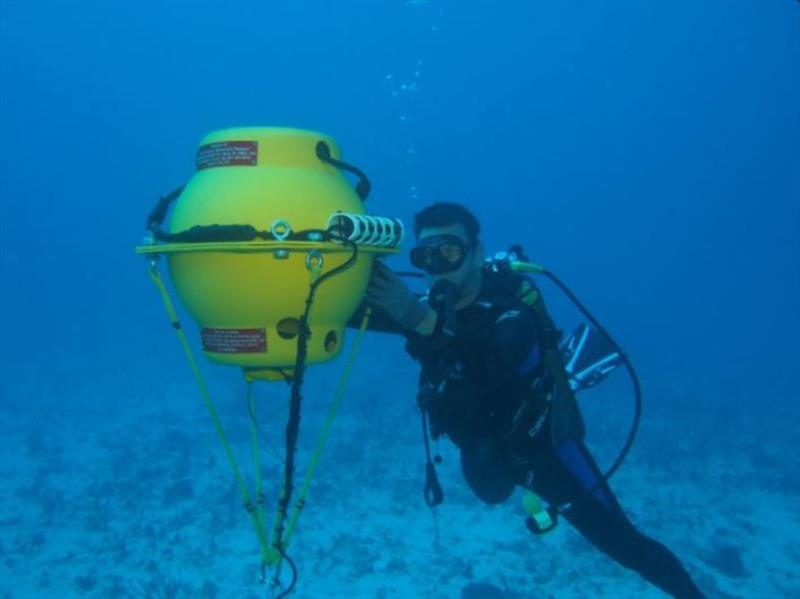 Jeremy Kiszka of Florida International University checks on one of the Marine Autonomous Recording Units (MARUs) deployed in the Caribbean in 2017 to record humpback songs and other ocean sounds photo copyright Thibaud Rossard, CHAMP / Guadeloupe taken at  and featuring the Cruising Yacht class