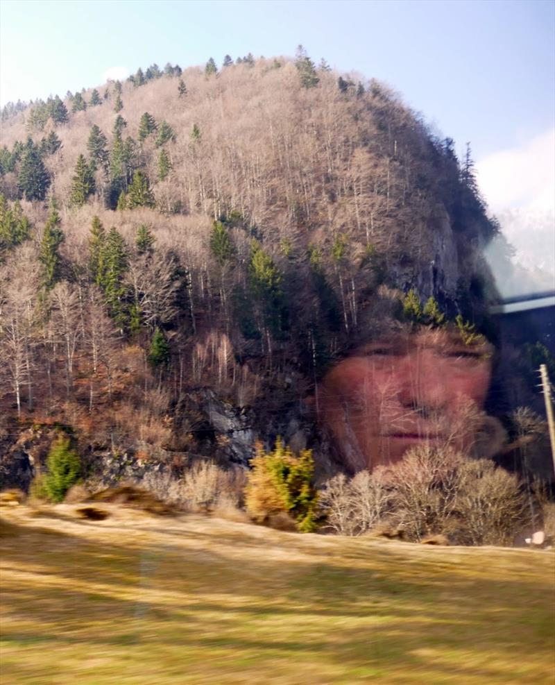 Moody picture reflection in the trains window - photo © SV Taipan
