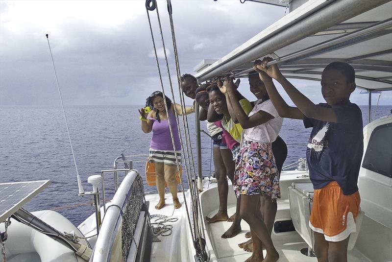 The kids and Sandra from Help for Dominica - photo © Mission Ocean