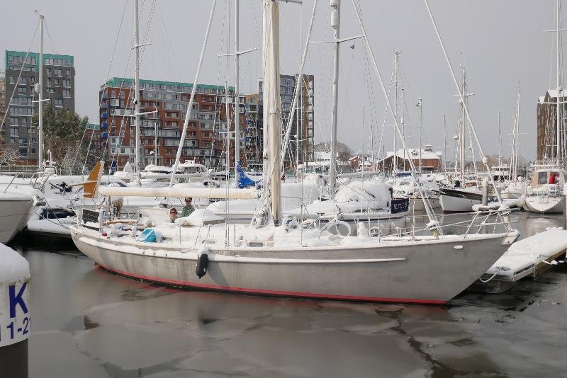 Snow on the decks and ice in the water. Sentijn. John and Kara Pennington and baby Dean below in the warm photo copyright SV Taipan taken at  and featuring the Cruising Yacht class