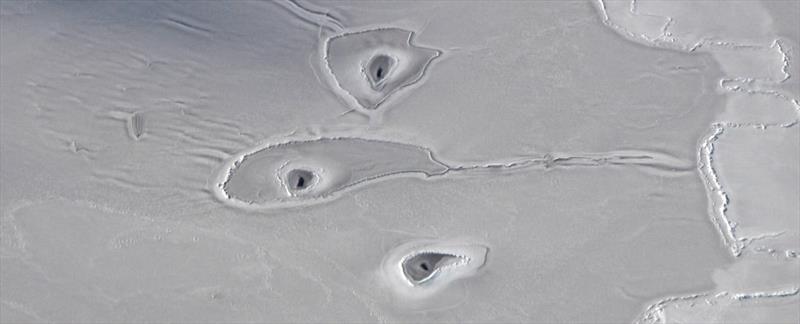 Arctic ice holes photo copyright John Sonntag / Operation IceBridge taken at  and featuring the Cruising Yacht class