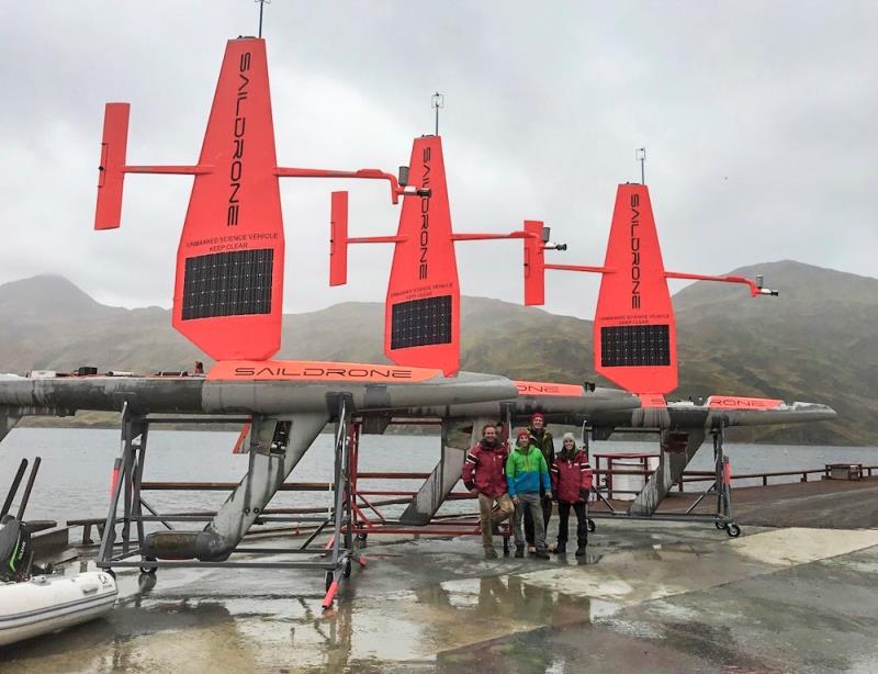 The saildrone recovery crew in front of three saildrones in Dutch Harbor, AK photo copyright Saildrone Inc. via NOAA PMEL taken at  and featuring the Cruising Yacht class