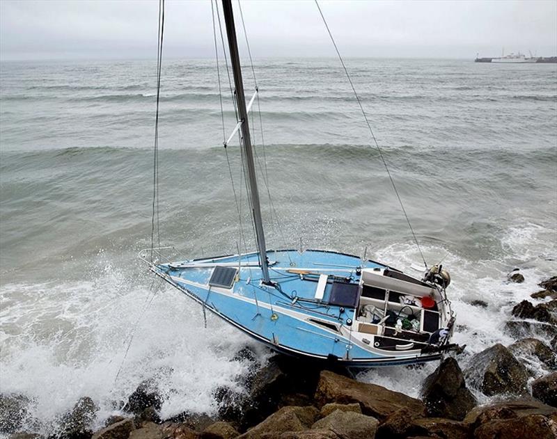 Yacht aground at Penzance photo copyright RNLI / Sam Kent taken at  and featuring the Cruising Yacht class