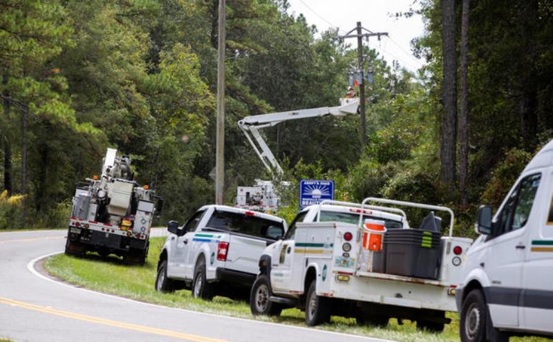 Talquin Electric linemen in Crawfordville, Florida, shut off the power to Shell Point Beach prior to the arrival of Hurricane Michael on Oct. 9, 2018 photo copyright Mark Wallheiser / Getty Images taken at  and featuring the Cruising Yacht class