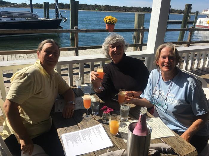 Skipper Anne with OCC member crew Eve Wilhite and PO Diane Tertrault celebrating Sofia's arrival in Beaufort, NC photo copyright Jonathan & Anne Lloyd taken at Ocean Cruising Club and featuring the Cruising Yacht class