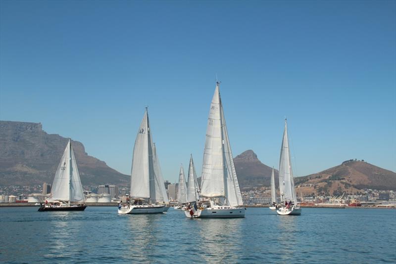 The fleet leaving Cape Town, South Africa photo copyright World Cruising Club taken at  and featuring the Cruising Yacht class