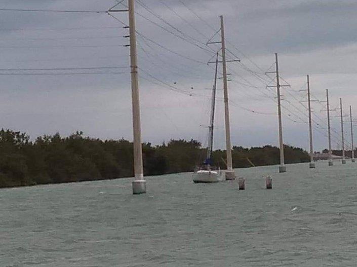 This sailboat knocked out power to all customers of Keys Energy Services for a time Tuesday photo copyright Keys Energy Services taken at  and featuring the Cruising Yacht class