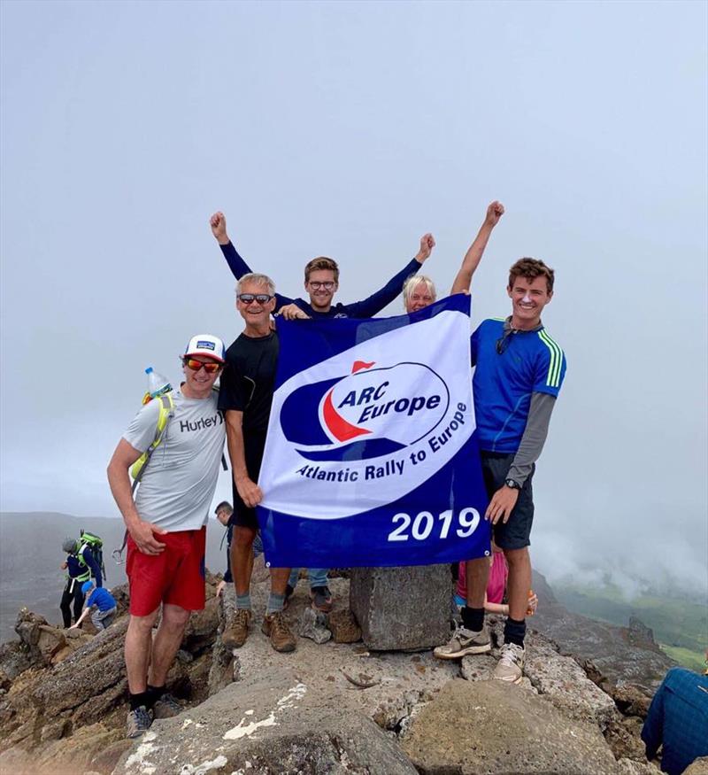 ARC Europe - ARC Europe flag made it to the top of Pico! Thanks to the crew of Mad Monkey, Amanda, Venture and Chantana! photo copyright World Cruising taken at  and featuring the Cruising Yacht class