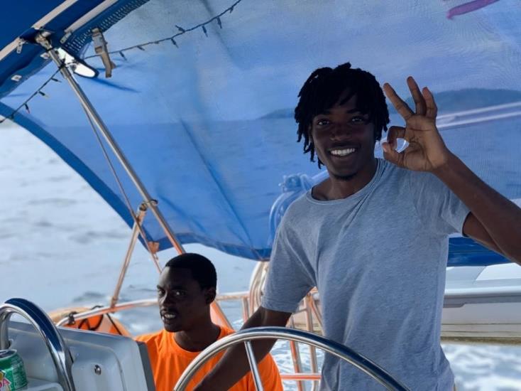 A student in the VIPCA Marine Apprenticeship Program takes the helm. - photo © Jim Jackson