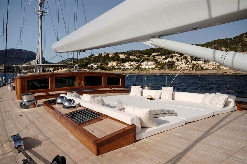 Family enjoyment onboard Aquarius II: one of many features that answer that role is the mid-deck lounge area with sun canopy, easily set up when at anchor. - photo © Carlo Baroncini