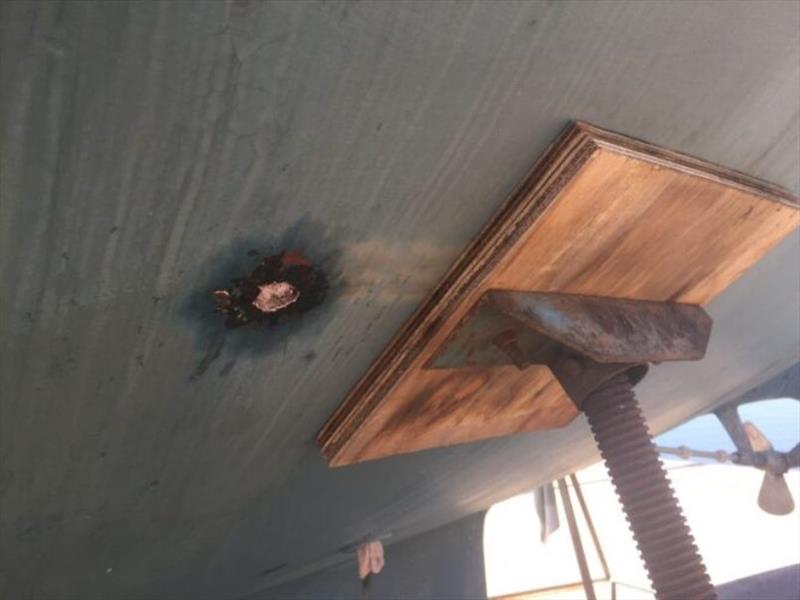 A boat that was struck by lightning on the hard