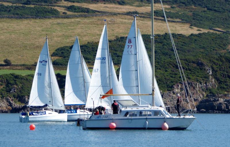 Larger cruiser yacht race getting underway with the Race Committee on “Alicat” the Committee boat at anchor, one end of the start line at Kippford Week 2022 - photo © Becky Davison