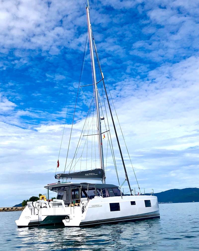 New Nautitech 40 Open 'La Luna' anchored in Spain photo copyright Ensign Yachts taken at  and featuring the Cruising Yacht class